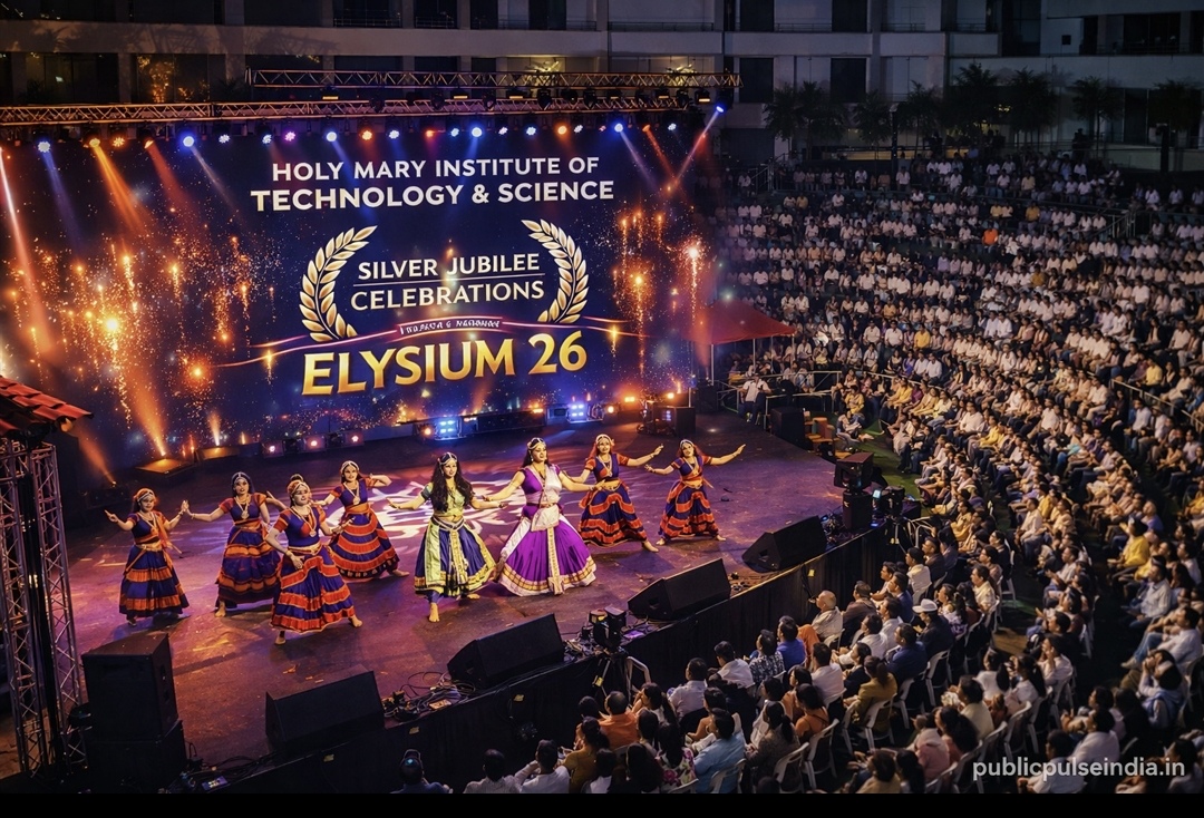 A grand cultural dance performance on the stage of Holy Mary Institute of Technology and Science (HITS) during Elysium 26 Silver Jubilee celebrations with a large audience and vibrant lighting.